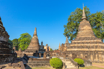 Fototapeta premium stupas at the Wat Mahathat in the Historical Park of Sukhothai, Thailand, Asia