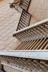 Elegant stone staircase with railings at the entrance to the medieval castle 15th century
