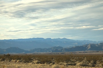 Desert landscape with distant mountain range