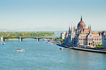 Fototapeta na wymiar Hungarian Parliament building, Danube river and boats