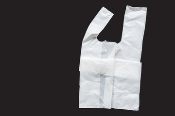 Plastic bag on a dark background. Say No to plastic bags. The concept of choice without plastic or environmental problems.