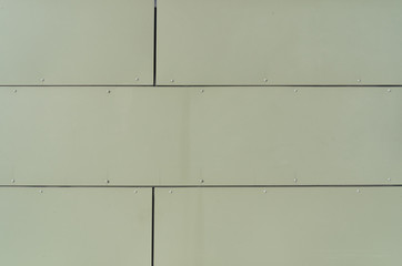 Green panel cover with panels of a facade with intermediate joints