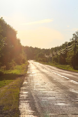 Broken road at sunset