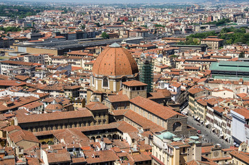 Fototapeta na wymiar Tower of palazzo vecchio in florence top view to roofs old town