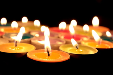 Candles light in night