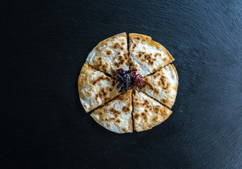 Traditional Turkish Borek Patty Pastry Food isolated on dark background.