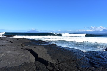 Ocean waves breaking off the shore