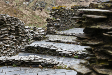 in the mountains near the sea, historically ancient settlements and fragments of the fortress ruins; fragments of ruins are made of natural stone slabs