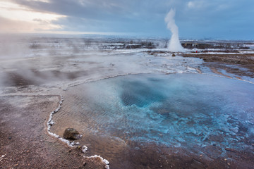 Strokkur Geyser eruption at dawn, Haukadalur Geothermal Area, Haukadalur, Arnessysla, Sudurland, Iceland, Europe
