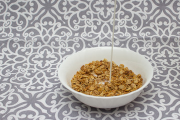 Granola, Oatmeal for breakfast. Oatmeal. Granola with milk, breakfast