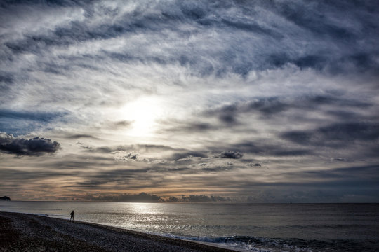 Beach with a cloudy sunset © Pablo