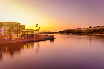 Fototapeta premium Colorful sunset in Old Havana with a view of the bay