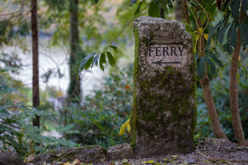 ferry sign in a garden 