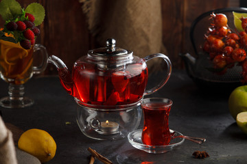 Red tea wooden background