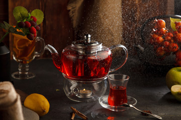 Red tea wooden background