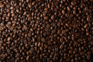 Coffee beans on the table background blurred abstract blurred