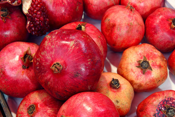 Group of pomegranates. Pomegranate closeup, background	