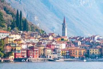 View of many color buildings in beautiful village Varenna, Como lake, Italy