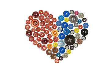 Heart laid out of buttons, isolated on white. Love concept