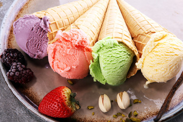 Set of ice cream scoops of different colors and flavours