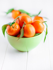 bowl of fresh mandarins, straight from the tree