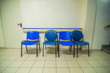 blue chairs in the waiting room