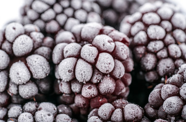 Close up view on frozen Blackberry fruits, food background