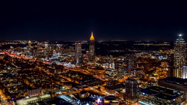Atlanta Aerial v483 Hyperlapse crossing low to high over downtown at night, picturesque cityscape 12/18