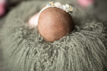 Newborn the fontanel on the crown of the head. the hair of the newborn. newborn baby's head