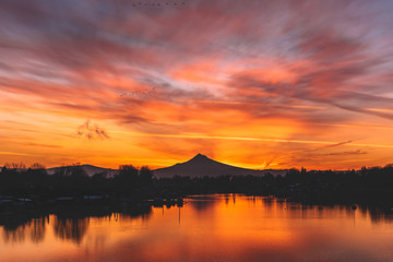 Vibrant reflective sunrise over Mt Hood and Columbia River
