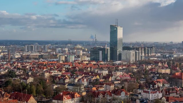 Time lapse, aerial view of beautiful Gdansk-Oliwa in Poland with clouds moving fast