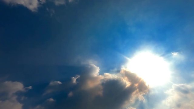 Time lapse of sky moving and cloud sun beam line light shining through the clouds