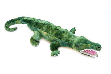 Green soft stuffed toy Crocodile isolated on white background.