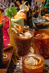 Selection of colorful festive drinks, alcoholic beverages and cocktails in elegant glasses