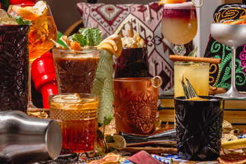 Selection of colorful festive drinks, alcoholic beverages and cocktails in elegant glasses