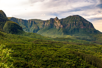 View of the walls of the Espraiado Canyon from the Road of Corvo Branco, with dense forest ahead, Airue, Santa Catarina, Brazil