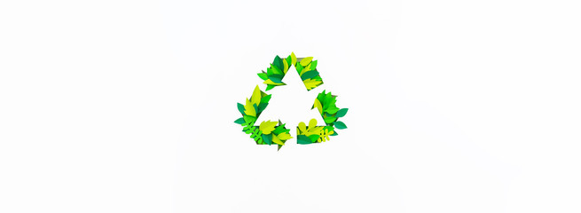 Green color recycling sign made from paper leaves. Copy Space Cut tropics plant. Banner