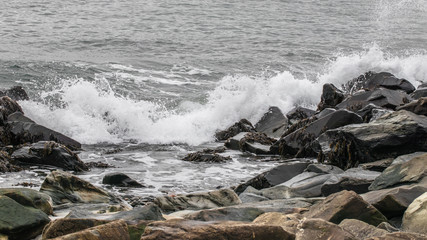waves crashing on rocks