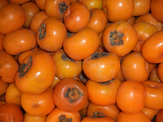 fresh ripe persimmon of the new crop