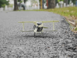 Airplane toy on the road in the health park