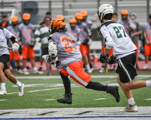 Young athletes making amazing plays while playing Lacrosse