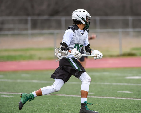 Young athletes making amazing plays while playing Lacrosse