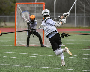 Young athletes making amazing plays while playing Lacrosse
