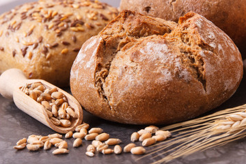 Rolls or bread with seeds and ears of rye grain