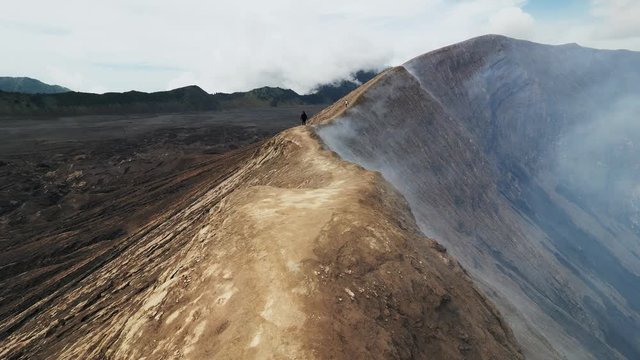 People on crater of the volcano Gunung Bromo in East Jawa.