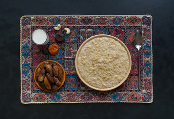 Oatmeal with dates and milk. Ramadan food. 