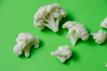 set of cauliflower top view, cauliflower on a green background