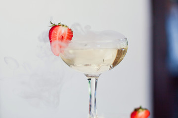 Several glasses of cocktail with strawberry