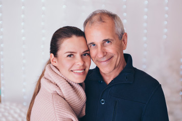 couple in love hugs on white background. man and woman smiling. Valentine's day