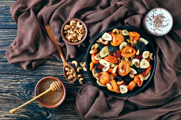 dried Fruits, Nut honey, yogurt, flat lay